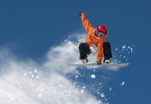 Storia dello snowboard: dai garage alle Olimpiadi 16 0 Snowboarder in salto